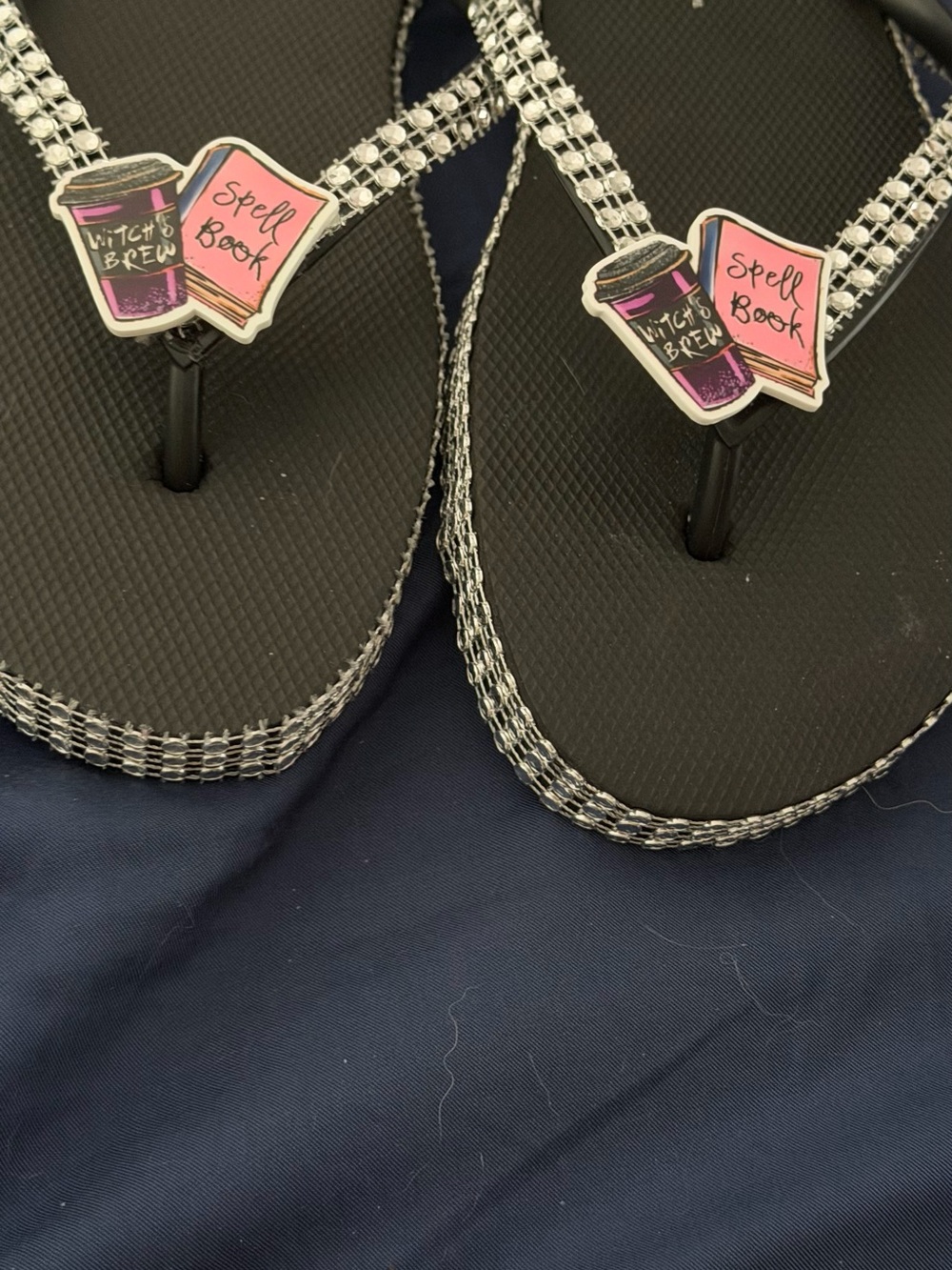 Women’s Black Flip Flops with Pink Spell Book Charm
